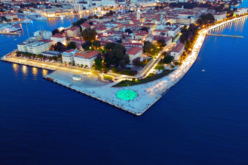 Sea organ, attraction in Zadar, sun, sea, people, sunset, vivid colors